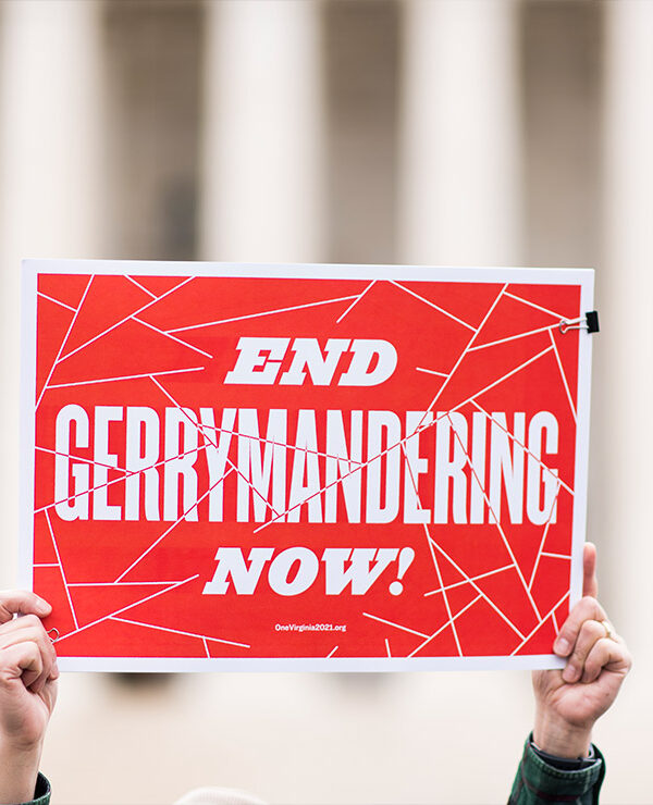 Gerrymandering activists gather on the steps of the Supreme Court as the court prepares to hear the the Benisek v. Lamone case on Wednesday, March 28, 2018.