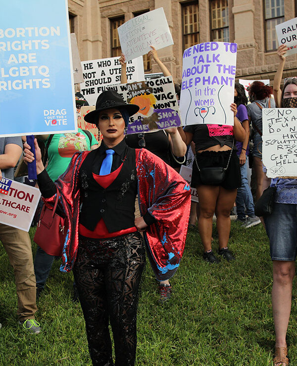 Demonstrators with pro-abortion-and-LGBTQ signage.