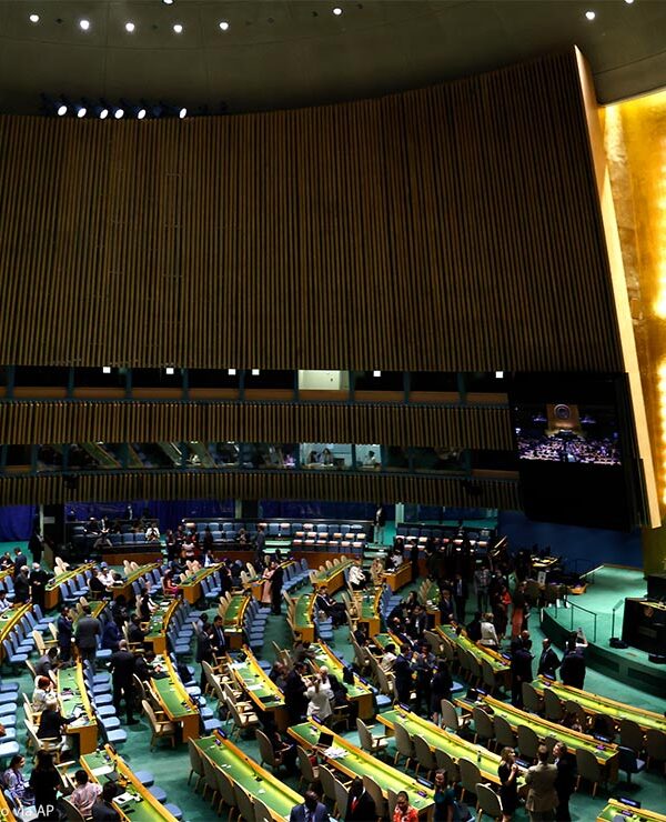 Delegates converse while in attendace at the United Nations General Assembly on October 26, 2022 in New York City.