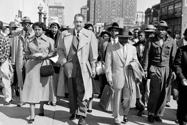 Autherine Lucy, left, front, 26-year-old student at the University of Alabama, arrives at U.S. District Court for the hearing of her petition for an order requiring the school to re-admit her to classes in Birmingham, Ala., Feb. 29, 1956. With Lucy are...