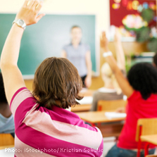 child raising hand