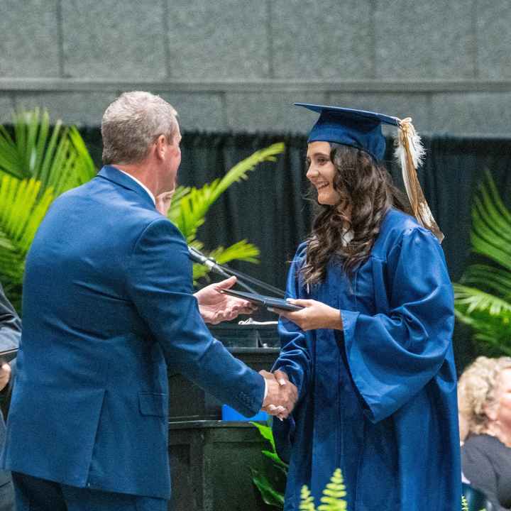 Zuri Wilson receiving her diploma.